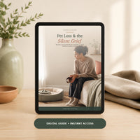 Pet Loss and the Silent Grief digital guide displayed on a tablet in a warm, calming home setting.
